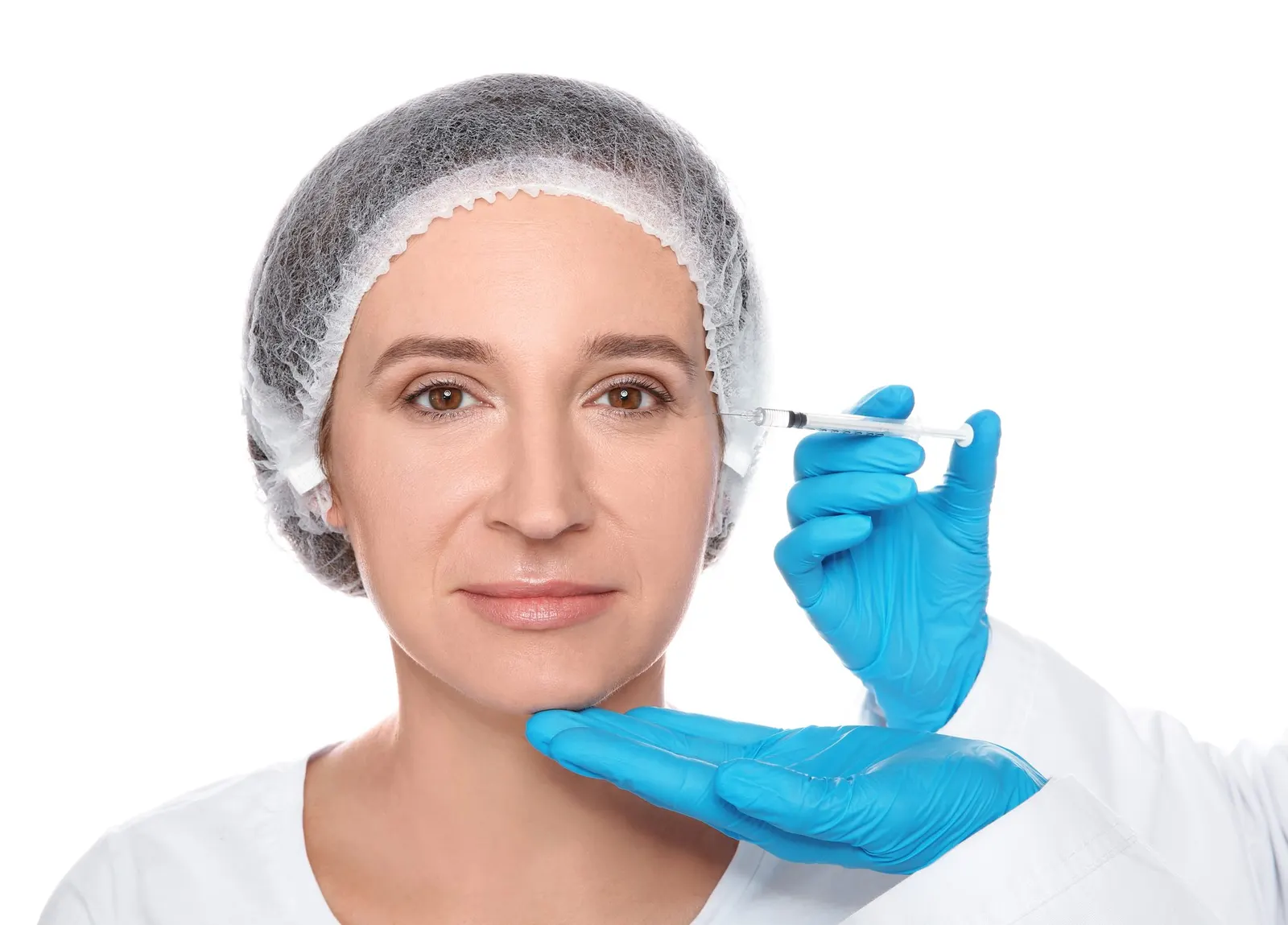 Injection in the cheek, gloved hands