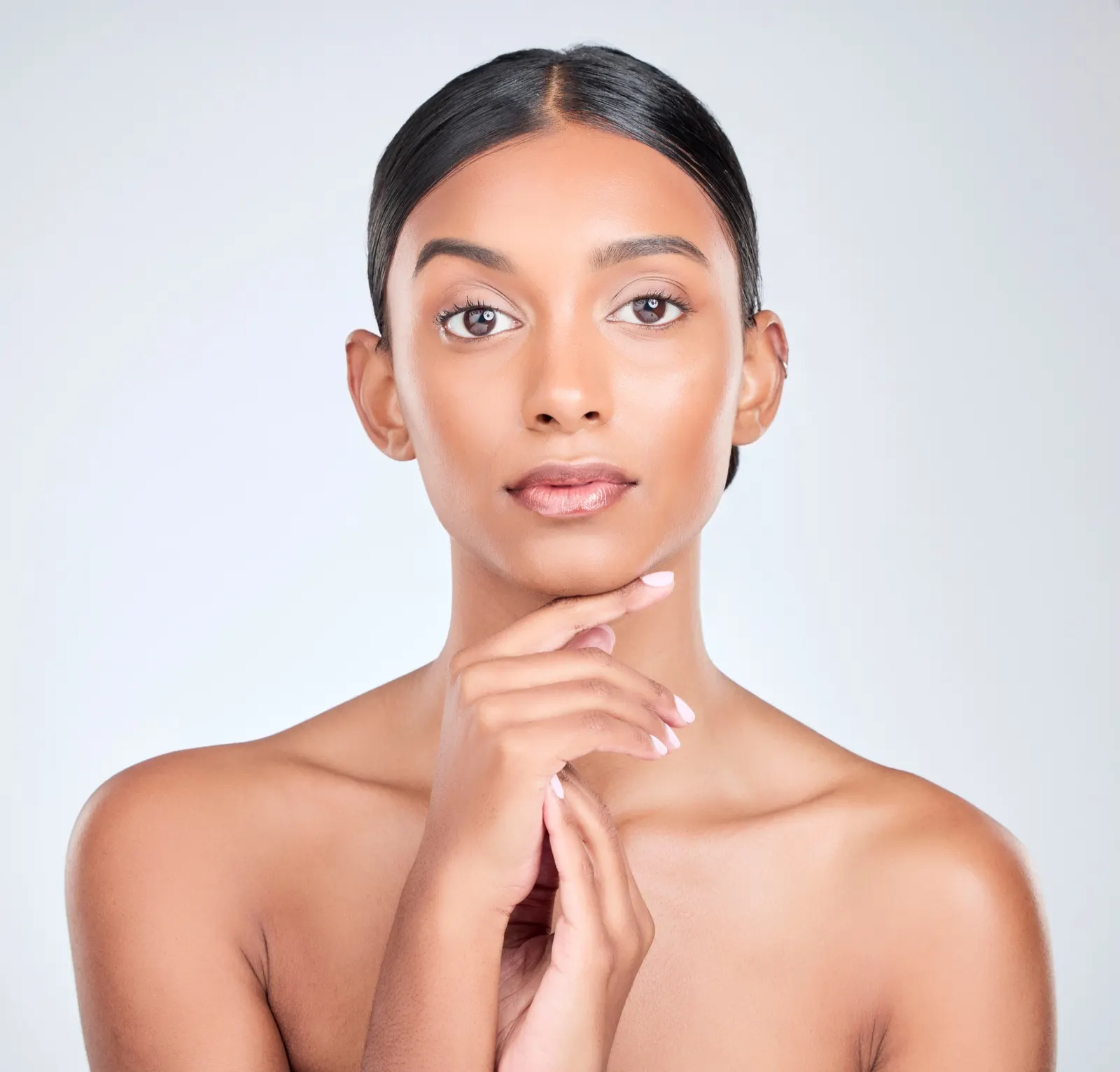 Portrait of a woman with healthy glowing skin — skinbooster and biostimulation