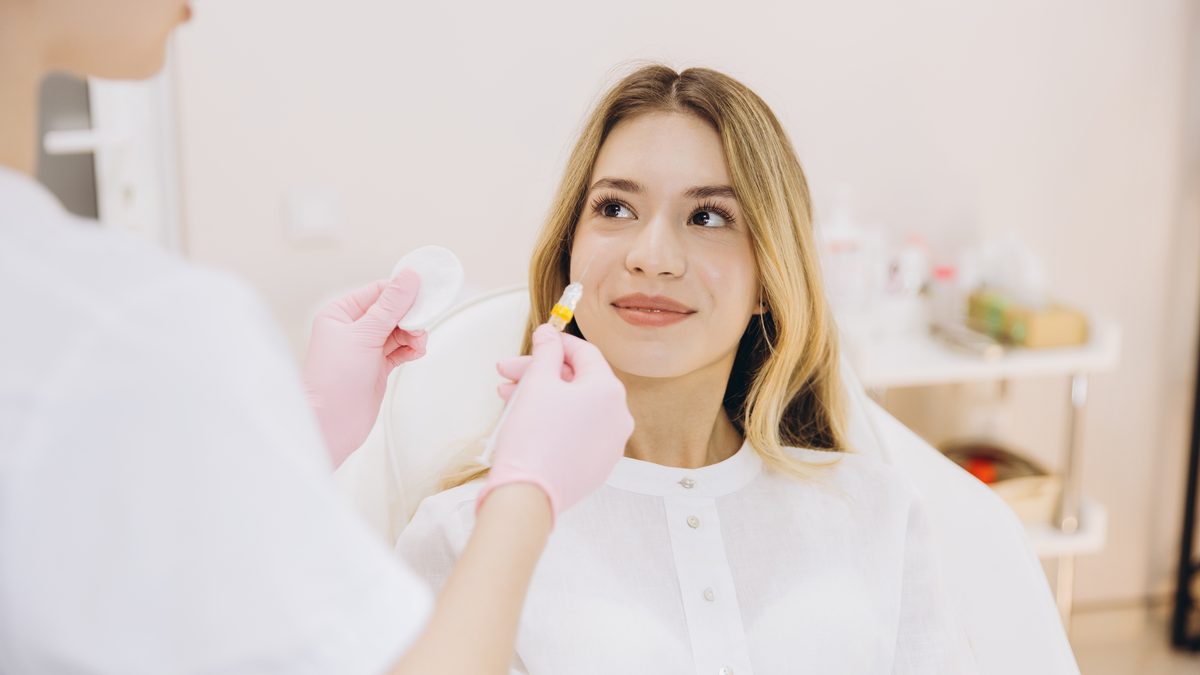 Radiant glowing skin result after aesthetic treatment at Cosmo Clinic Lisbon