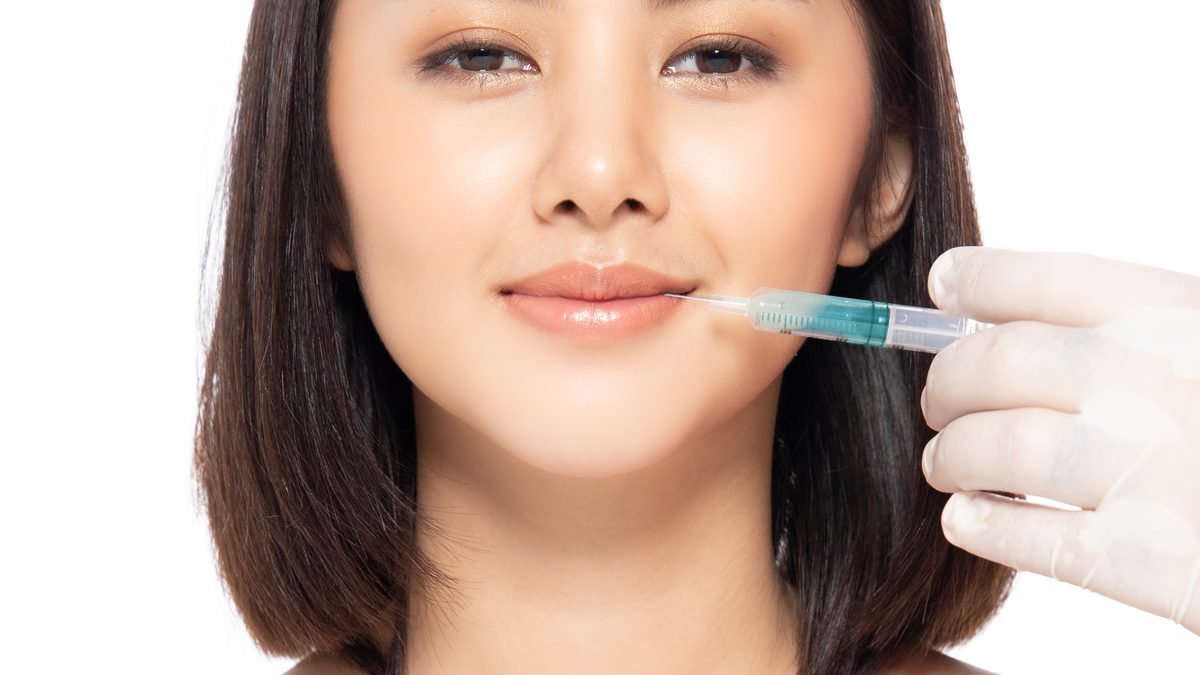 Lip filler injection at an aesthetic clinic in Lisbon