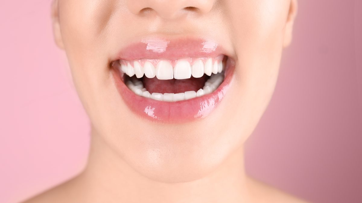 Natural glossy lip filler result at Cosmo Clinic Lisbon — transparent pricing 2026