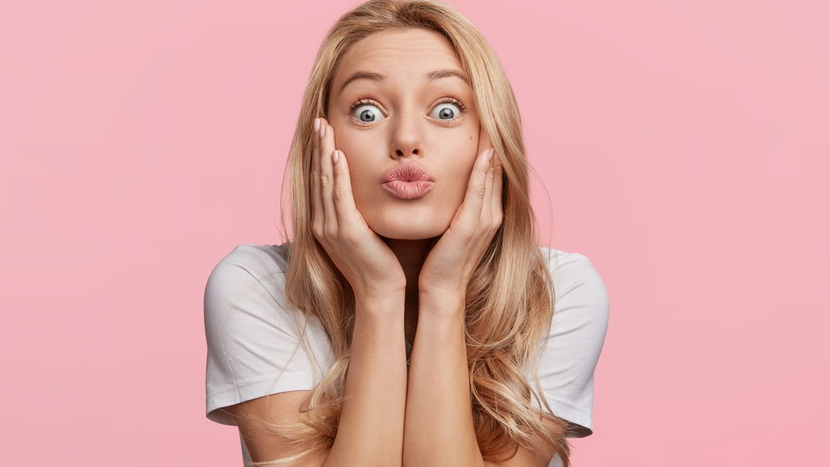 Natural lip filler result — subtle, defined lips with no overdone look at Cosmo Clinic Lisbon
